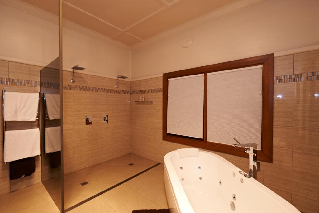 Luxuriously spacious. Free standing  bath. Double shower.